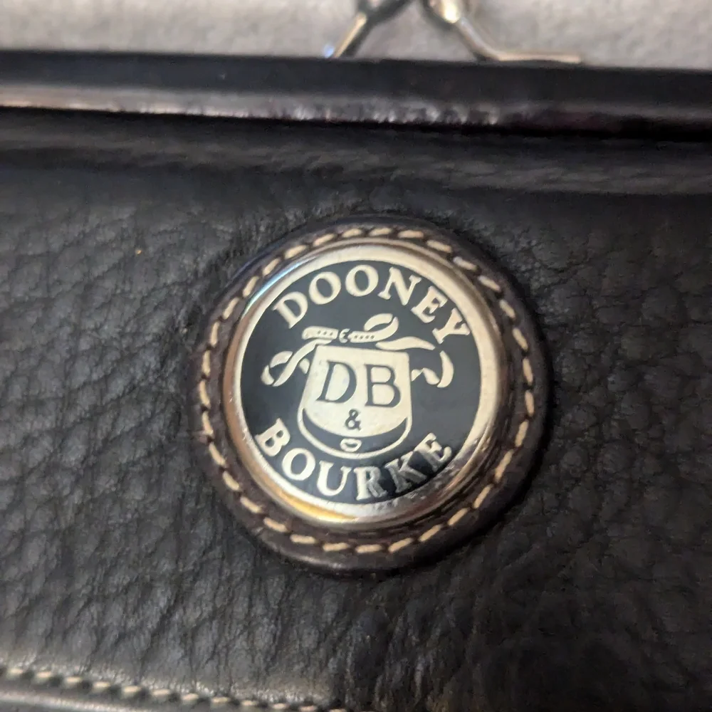 Vintage Dooney and Bourke billfold kisslock wallet